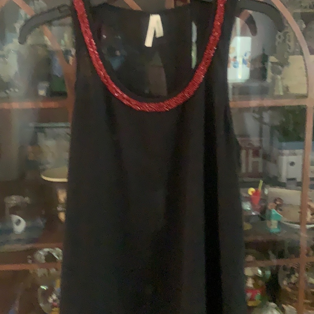 Black tank with beading front has 2 sheer  layers